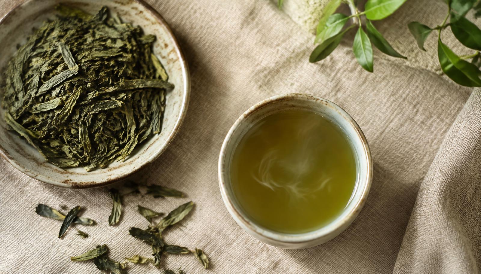 Loose leaf tea and a cup